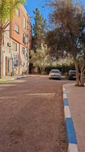 a car parked on the side of a street at Le cocon drargua in Agadir