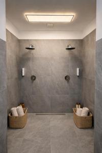 a bathroom with a shower with wicker baskets at Berlin Sleep Club in Berlin +16 photos