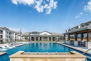 an image of a swimming pool at a resort at Chisholm Trace 1236 I Spacious 1 Bed 1 Bath in Cleburne