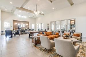 a living room with couches and tables and chairs at Unit 232 Comfy 2BR 2BA Retreat in Cleburne