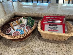 two baskets filled with food and books on a counter at Family Ski Getaway in Kirkwood