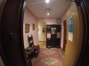 TV a/nebo společenská místnost v ubytování Hostal Suárez