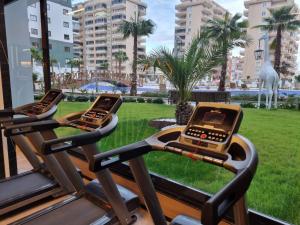 a row of treadmills in front of a window at Serenity Residence lux1plus1 in Alanya