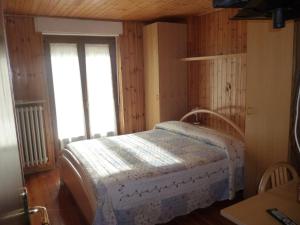 Postel nebo postele na pokoji v ubytování Hotel Fior di Roccia