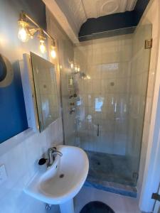 a bathroom with a sink and a shower at No7-Corner Studio in Bridgeport