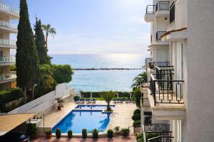 a view of the ocean from a building at Beach Front View Apartment Sea Pool & Prime Location in Limassol