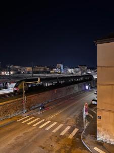 a train is on the tracks at night at L'arquebuse - Gare Dijon in Dijon