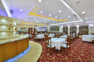 Ресторант или друго място за хранене в Grand Anka Hotel