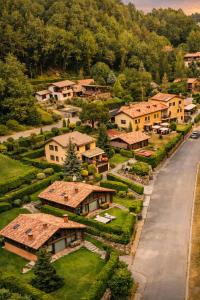 an aerial view of a village with houses at ELS OCELLS Apartaments i Cases Rurals in Camprodon