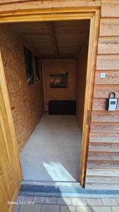 a room with stairs leading to a room with a couch at FeWo "Hafenquartier" in Barth