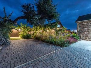 a brick driveway in front of a house at Lilla-Bett Self Catering Mossel Bay in Mossel Bay