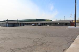 an empty parking lot in front of a building at Western Lodge Phoenix Airport/Downtown in Phoenix