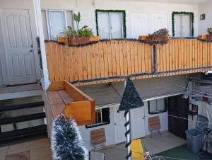 a view from the top of a house with plants at Puente alto alojamiento in Santiago +16 photos