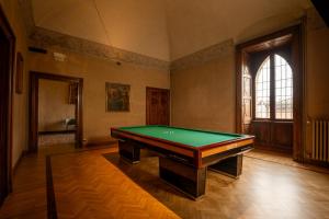 a large room with a pool table in it at Il Castello Di San Gaudenzio in Cervesina