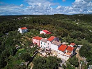 an aerial view of a house with red roofs at House Dawn in Rab