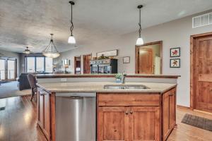 a kitchen with a sink and a counter at Bridges Bay Resort Coronado building 200 in Arnolds Park
