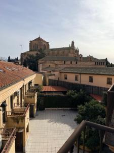 a view from a balcony of a city with buildings at Domus Altiora Centro in Salamanca