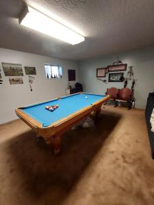 a living room with a pool table in it at Beautiful Country Location in Harrisville