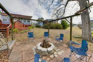 a group of chairs sitting around a fire pit at Couple’s Retreat w/ Dock Access on Lake Eufaula! in Georgetown
