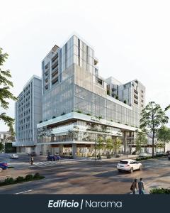 a large glass building with a parking lot at Narama 1 - Apartamento cerca del aeropuerto - Zona 13 de la Ciudad de Guatemala in Estación Pamplona