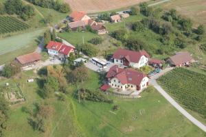 an aerial view of a large house with red roofs at Tourist Farm Joannes in Maribor