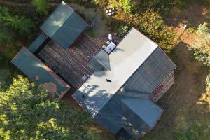 an overhead view of a building with a roof at Authentic Summerhouse Near The Beach in Rørvig
