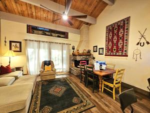 a living room with a couch and a table at Cheyenne's Place home in Kings Beach