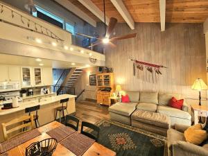 a large living room with a couch and a kitchen at Cheyenne's Place home in Kings Beach +21 photos