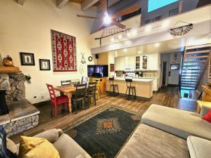 a living room and kitchen with a couch and a table at Cheyenne's Place home in Kings Beach