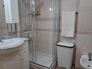 a bathroom with a shower and a sink at Ultreia in Arcade +13 photos