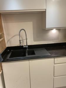 Kjøkken eller kjøkkenkrok på Spec Apartment