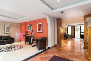 Гостиная зона в Hotel Americain