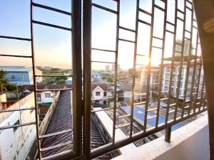 a view from a window of a city at J&T House And Friends in Ban Khlong Nam Ron