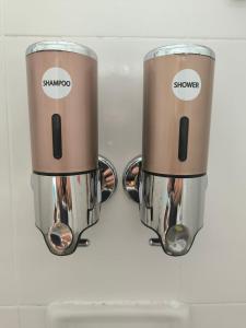 two coffee makers sitting on top of a counter at SB The Moon Night Betong in Betong
