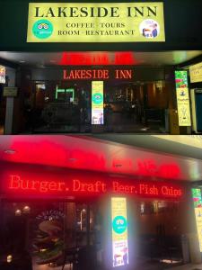 a fast food restaurant with signs on the front of it at Lakeside Inn in Guilin