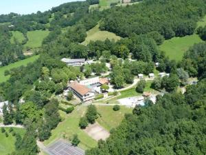 an aerial view of a house with a tennis court at Chalet avec terrasse - 2 pers. - API-1-52-1592 in Saint-Girons