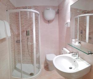 Koupelna v ubytování Hotel Umbra