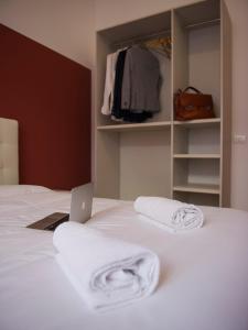 Postel nebo postele na pokoji v ubytování Italianflat - Rentroom Verona
