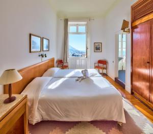 Postel nebo postele na pokoji v ubytování Hotel Monte Carlo