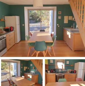 a kitchen with green walls and a table in a room at Le Trible in Labeaume