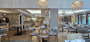 Un restaurant sau alt loc unde se poate mânca la Hotel Orizont Cozia