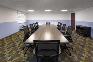 a large conference room with a long table and chairs at Baymont by Wyndham Westampton in Westampton Township