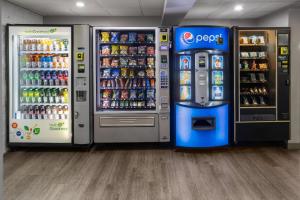 two vending machines in a store with soda machines at Baymont by Wyndham Westampton in Westampton Township