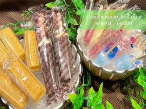 a bunch of ice cream in plastic containers on a table at Onyado Nono Asakusa Natural Hot Spring in Tokyo