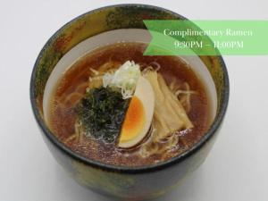 a bowl of ramen with an egg in it at Onyado Nono Asakusa Natural Hot Spring in Tokyo