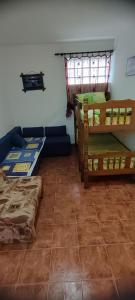 a room with two beds and a window at Apartman Jasna in Herceg-Novi +2 photos