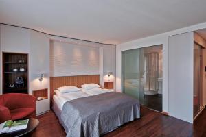 En eller flere senge i et værelse på Sorell Hotel Rütli Niederdorf Zürich
