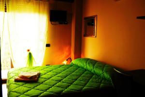Postel nebo postele na pokoji v ubytování B&B Il Fruscio