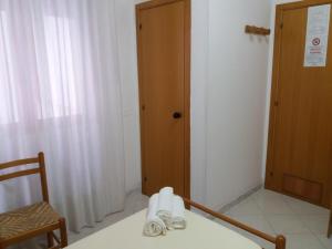 Postel nebo postele na pokoji v ubytování Hotel Europa