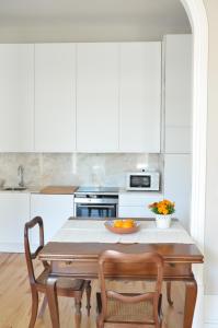Virtuvė arba virtuvėlė apgyvendinimo įstaigoje Arty apartment - Porto downtown